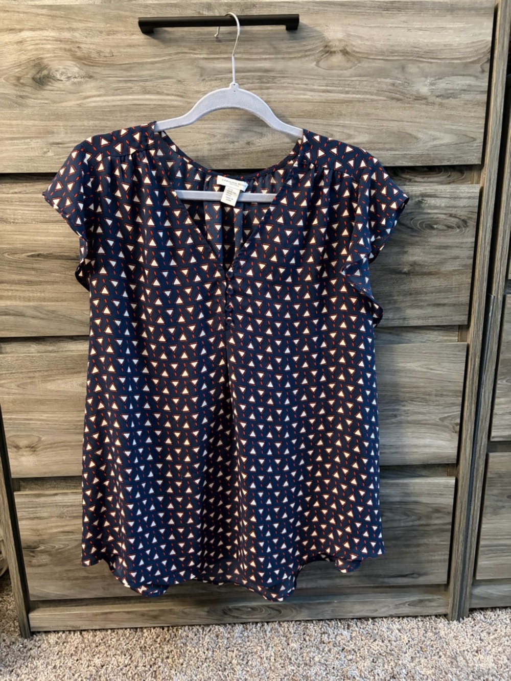 Carolina Belle Navy Geometric Cap-Sleeve Blouse with Coral and White Accents